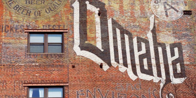 Omaha Sign in the Old Market, symbolizing "Why America First Investment Advisors?