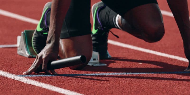 Runner at starting blocks, symbolizing QuickStart program of America First Investment Advisors